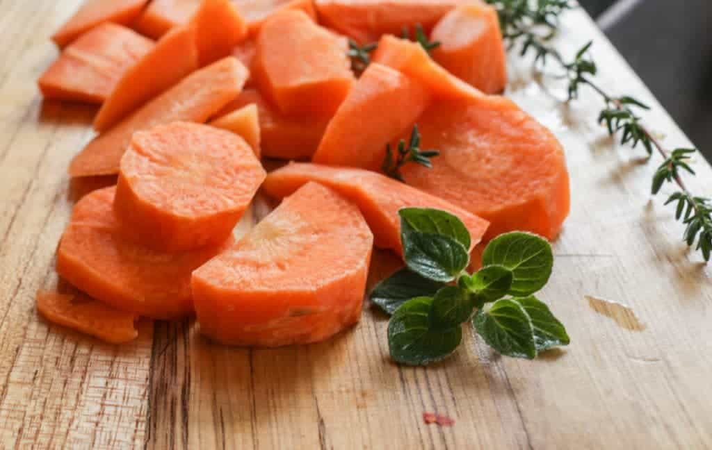 homegrown carrots and herbs