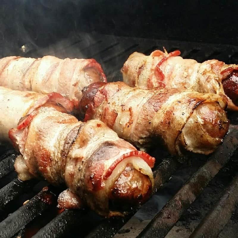 Grilled bacon wrapped brats