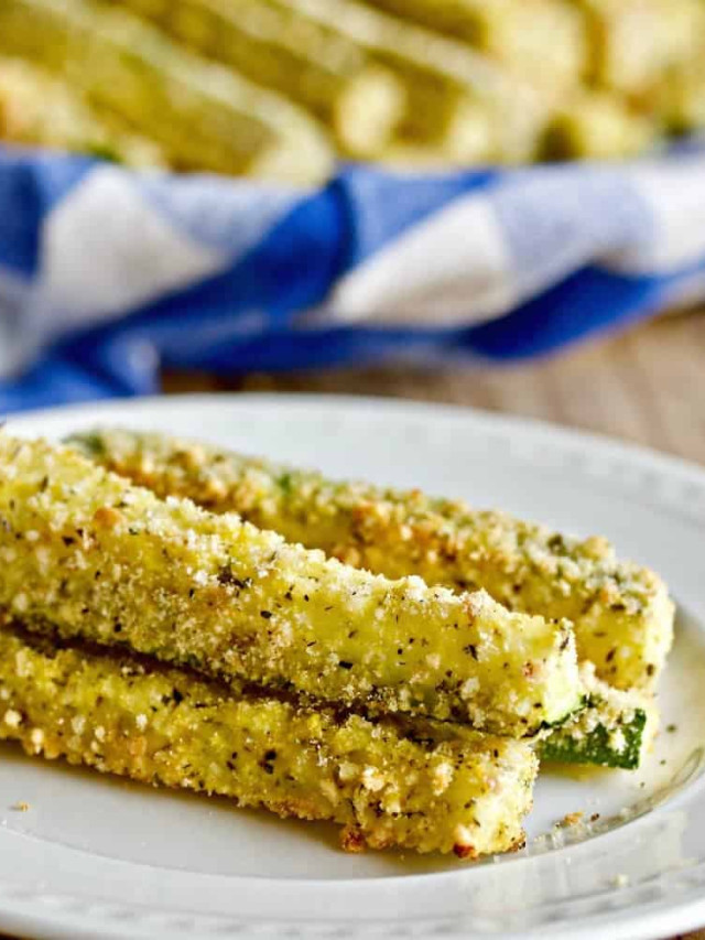 a plate of fried zucchini sticks