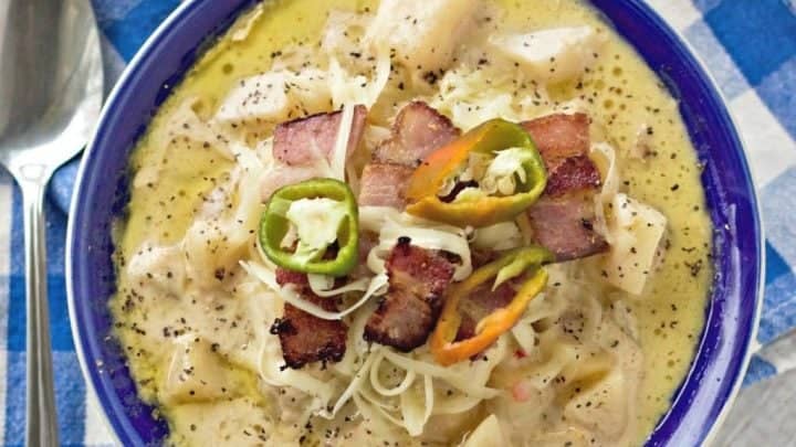 Loaded Baked Potato Crock Pot Soup is thick, rich comforting food. Full of creamy cheeses, potatoes and cream. Crunchy bacon, peppers and shredded cheddar cheese garnish the top for added texture and flavor.