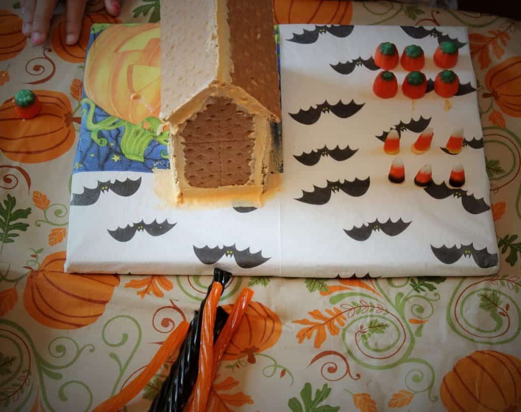 Graham cracker house with royal icing. Recipe for Royal icing included