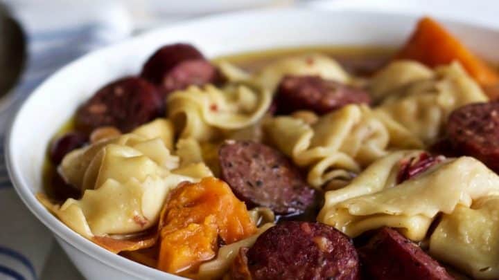 Crock pot tortellini sausage soup. An easy, high fiber meal! https://homemadefoodjunkie.1wp.site