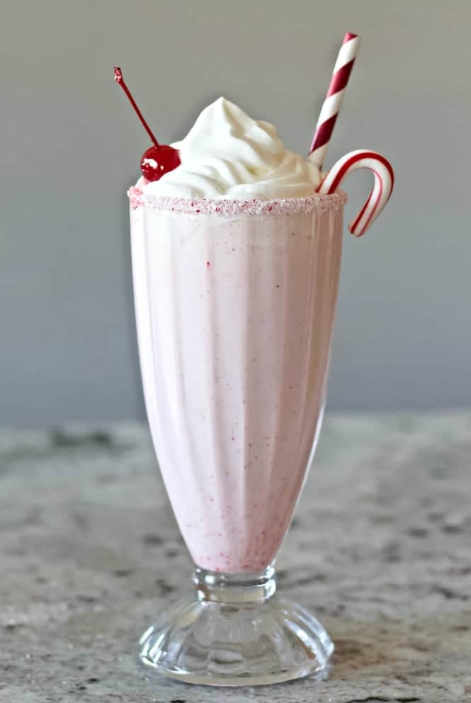 Peppermint Milkshake with Schnapps Liqueur in a candy rimmed soda glass