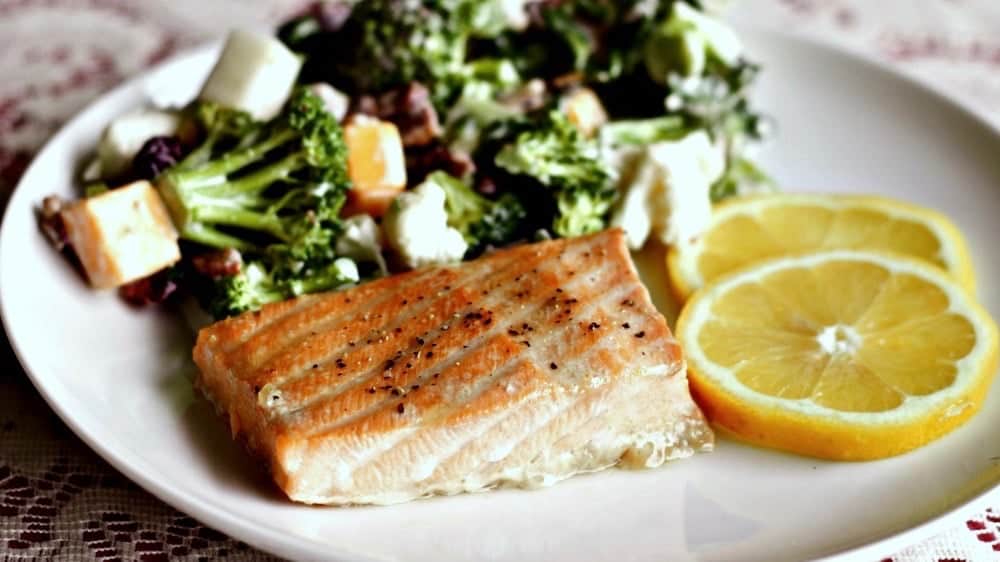 Easy baked salmon with a brown sugar marinade is a perfect choice for a delicious, low carb, dairy -free, gluten-free meal choice. Chock full of good for you lean protein and healthy fat with a yummy marinade! https://homemadefoodjunkie.1wp.site