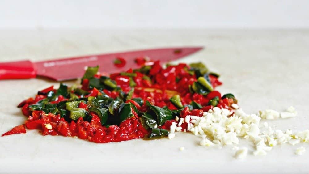 Chopped roasted peppers and garlic