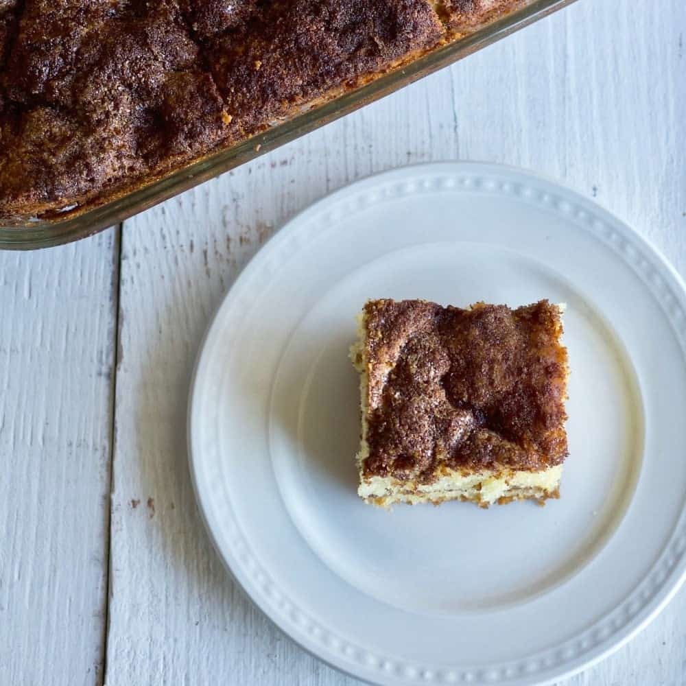 Delectable Coffee Cake is a moist light coffee cake with a cinnamon sugar streusel made entirely from scratch with coconut oil.