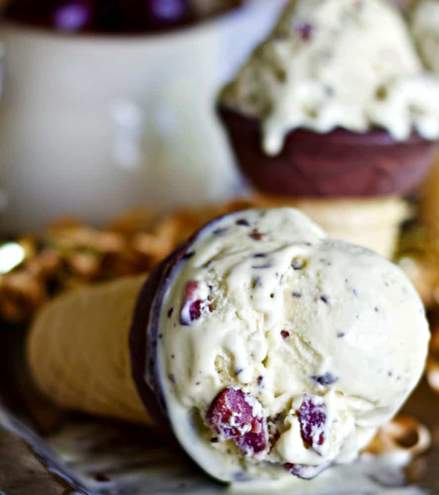 Dark Chocolate Cherry Custard Ice Cream summer time fruity freshness and dark chocolate decadence blended into a creamy base of frozen custard. So good! https://homemadefoodjunkie.1wp.site