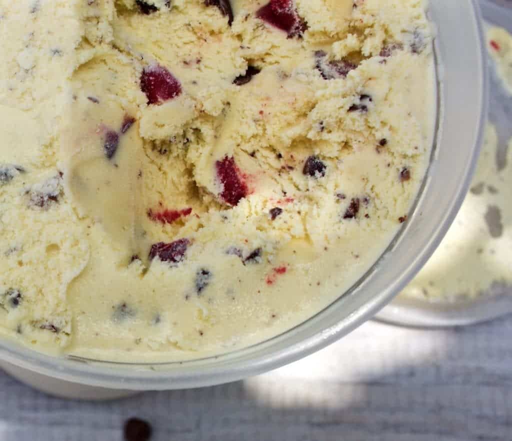 Dark Chocolate Cherry Custard Ice Cream summer time fruity freshness and dark chocolate decadence blended into a creamy base of frozen custard. So good! https://homemadefoodjunkie.1wp.site