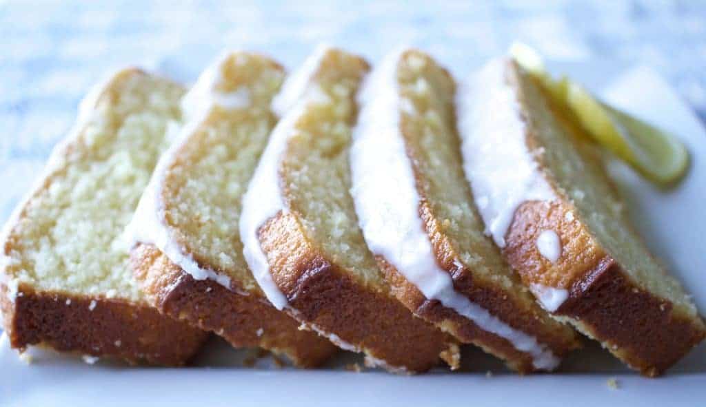 Iced Lemon Loaf is a Light and sweet lemon loaf dripping with a lemony iced glaze. This sweet loaf goes perfect with party platters and a cup of coffee!
