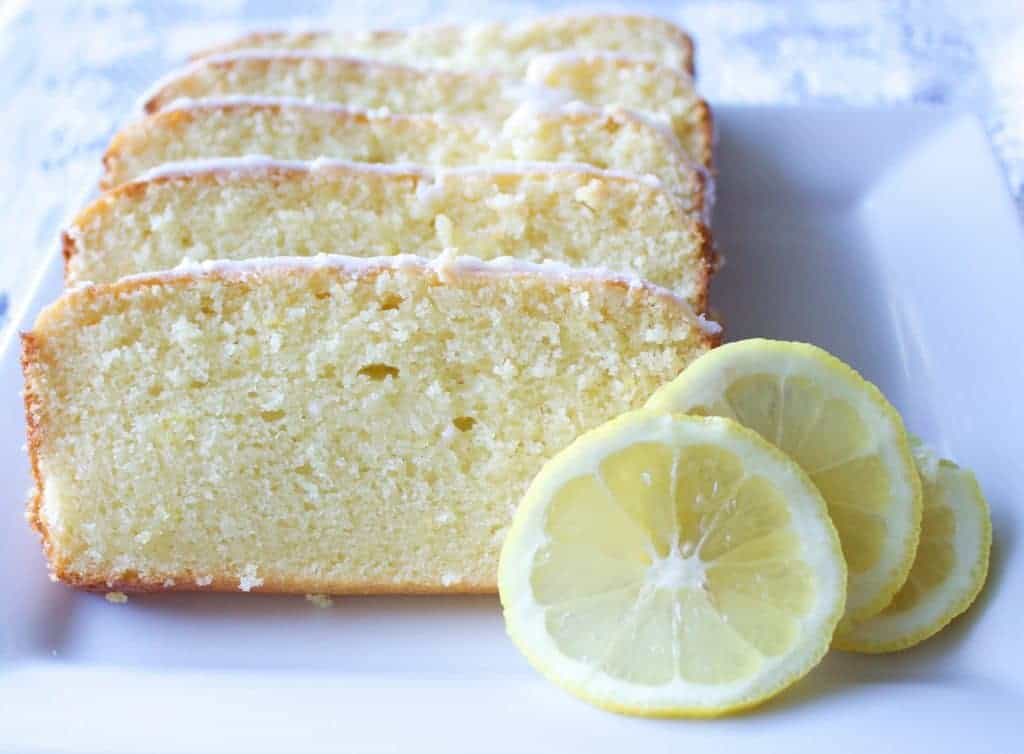 Iced Lemon Loaf is a Light and sweet lemon loaf dripping with a lemony iced glaze. This sweet loaf goes perfect with party platters and a cup of coffee!