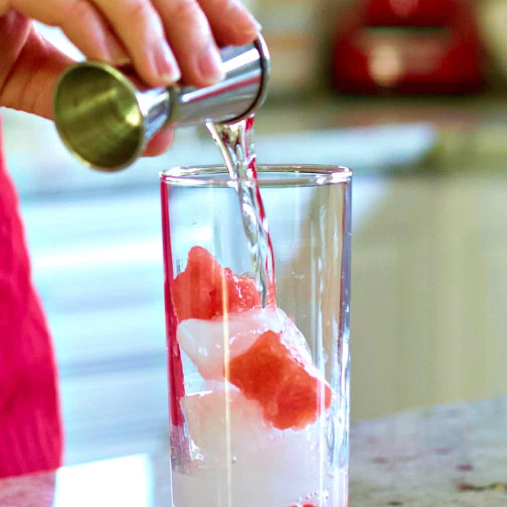 Pouring the Peach Schnapps