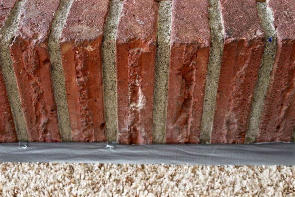 Use duct tape to mask off carpet edge
