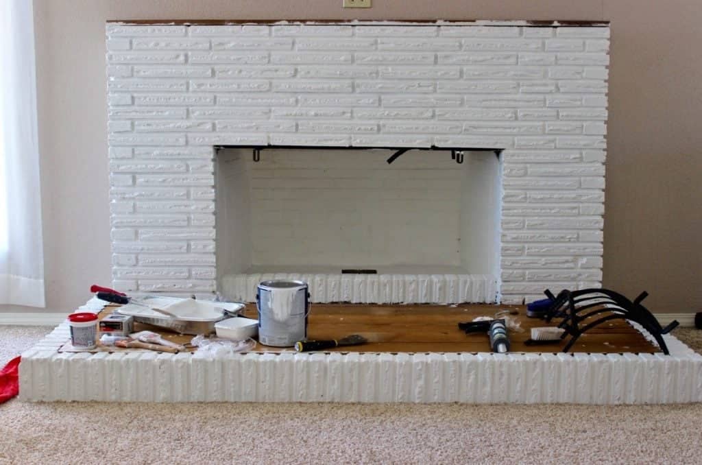 Painted white brick fireplace 