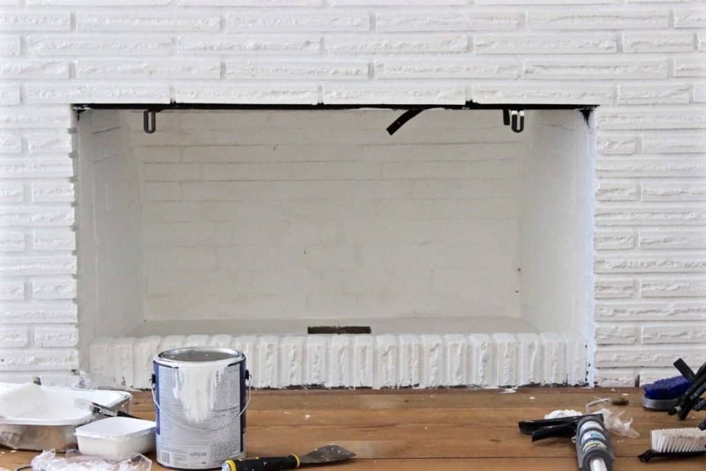 Painted white brick fireplace 