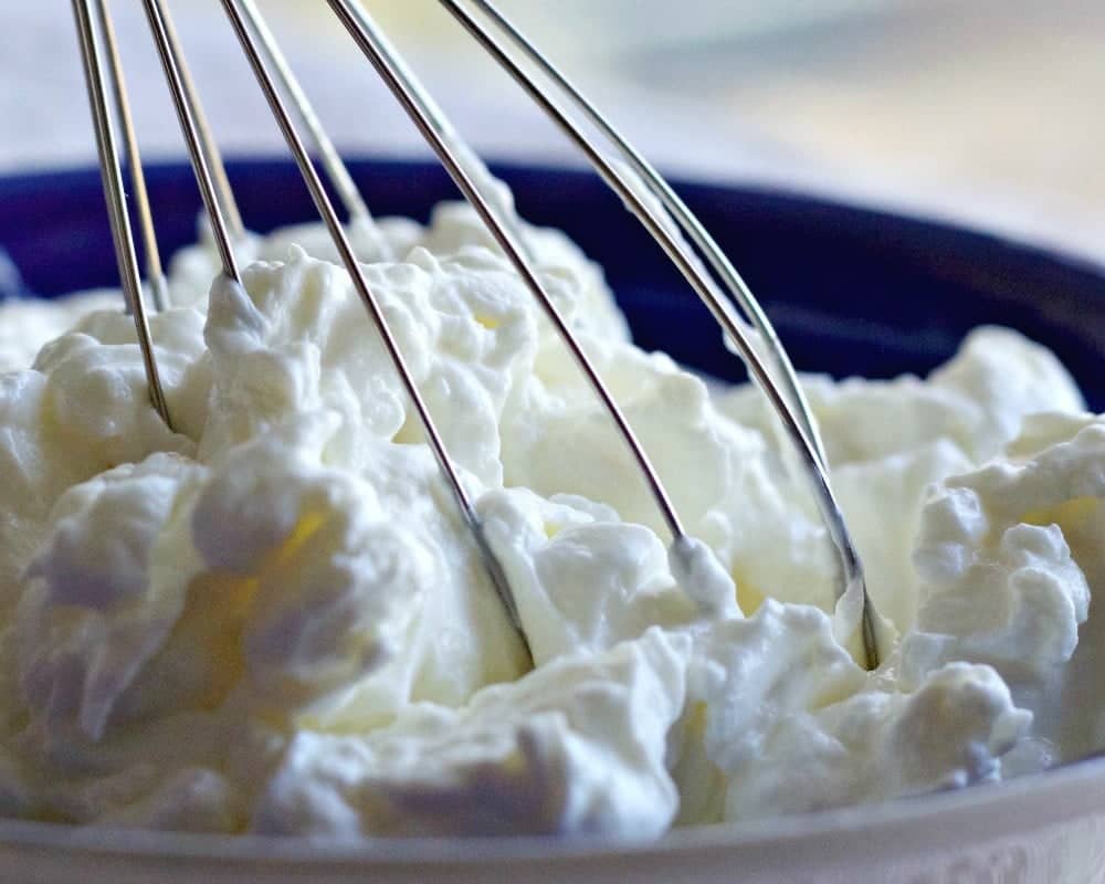 Homemade Greek Yogurt so easy to make and saves you HALF the money of store bought! https://homemadefoodjunkie.1wp.site