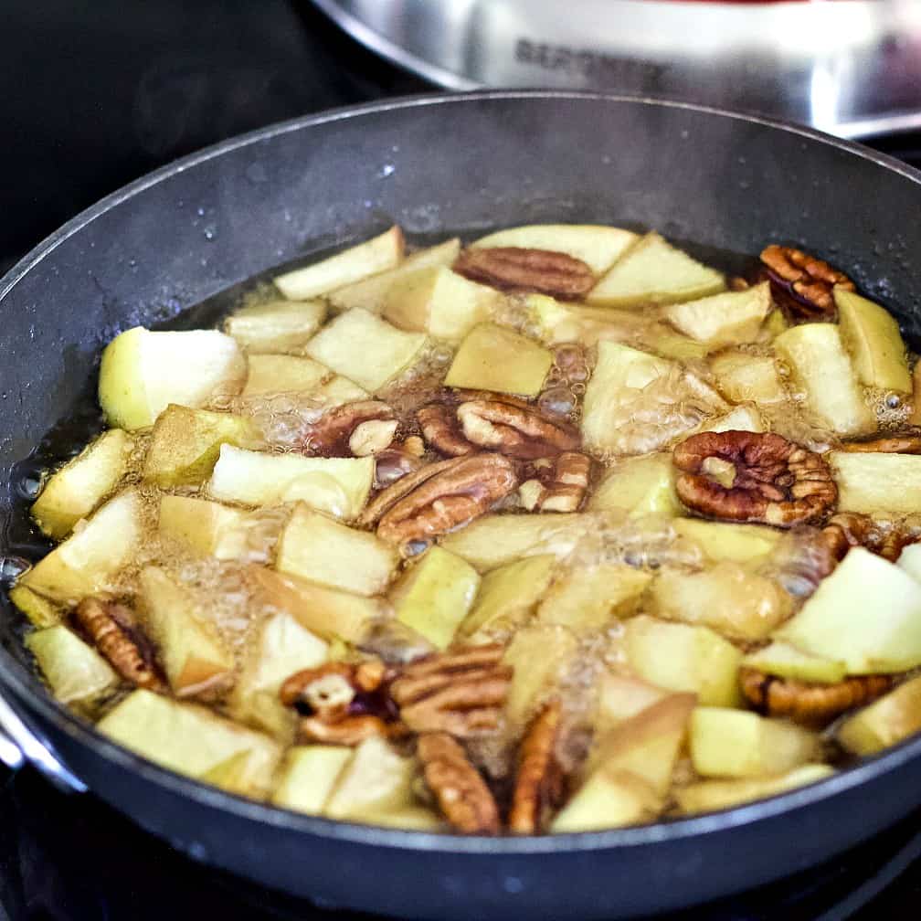 cooked apples and pecans ready to top steel cut oats