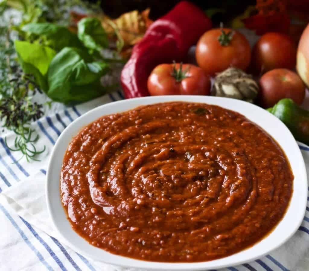 Roasted Crockpot Tomato Sauce in a white bowl.