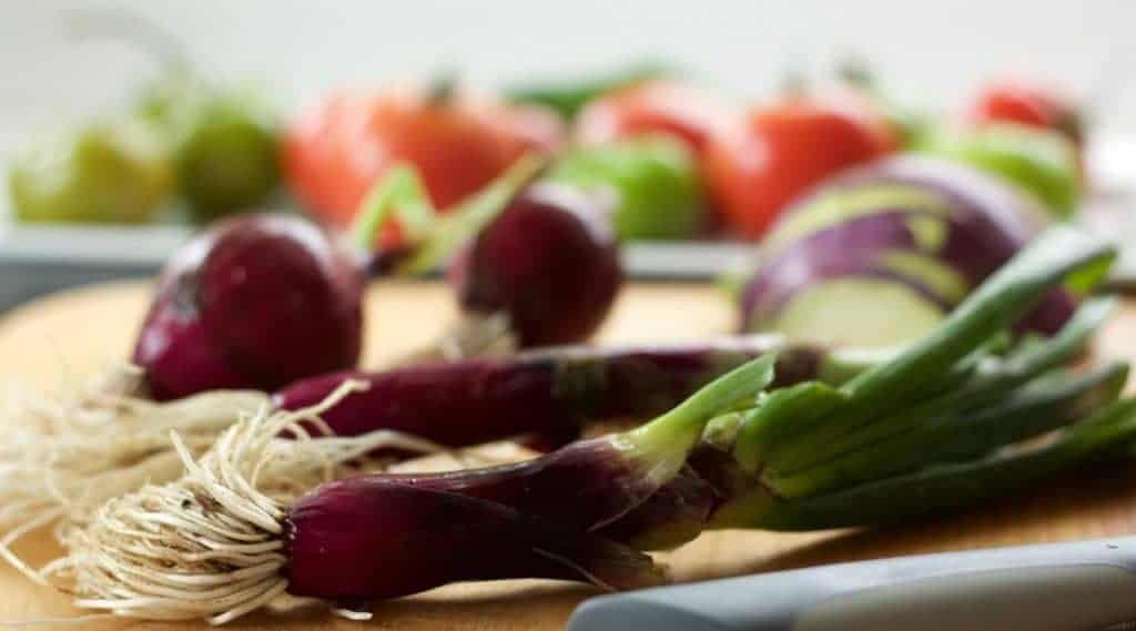 Small red onions. homegrown produce and marinara sauce for Chicken Noodle Minestrone