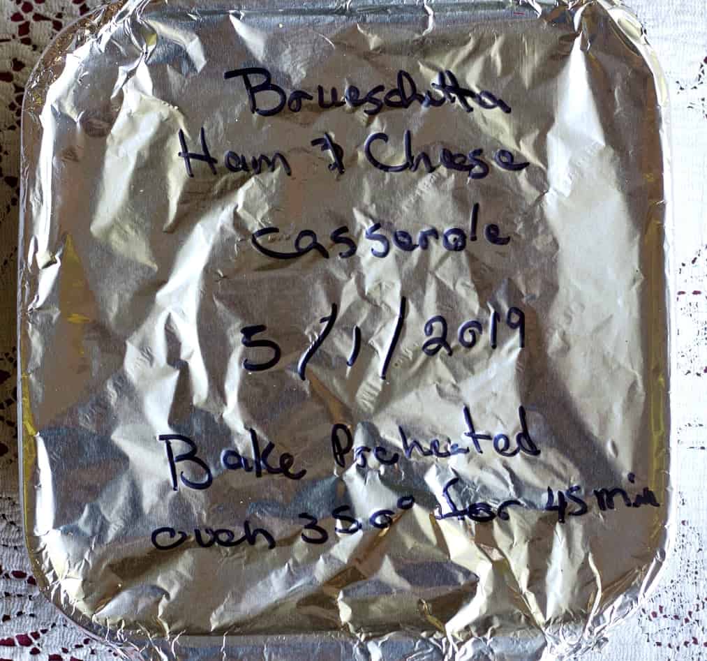 Ham Noodle Casserole foil wrapped and labeled for the freezer.