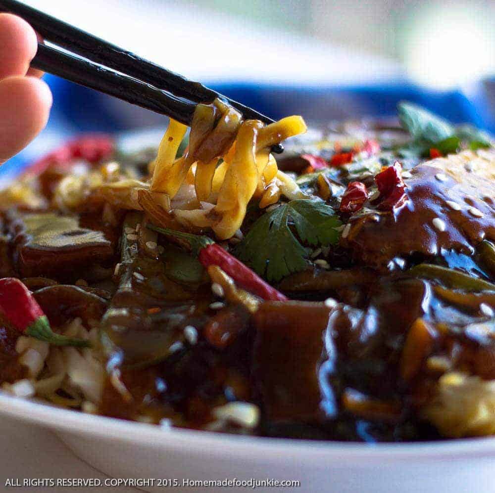 Sesame Beef Thai noodle dinner 3 Sesame Beef Thai Noodle Dinner with chopsticks pulling out the noodles.