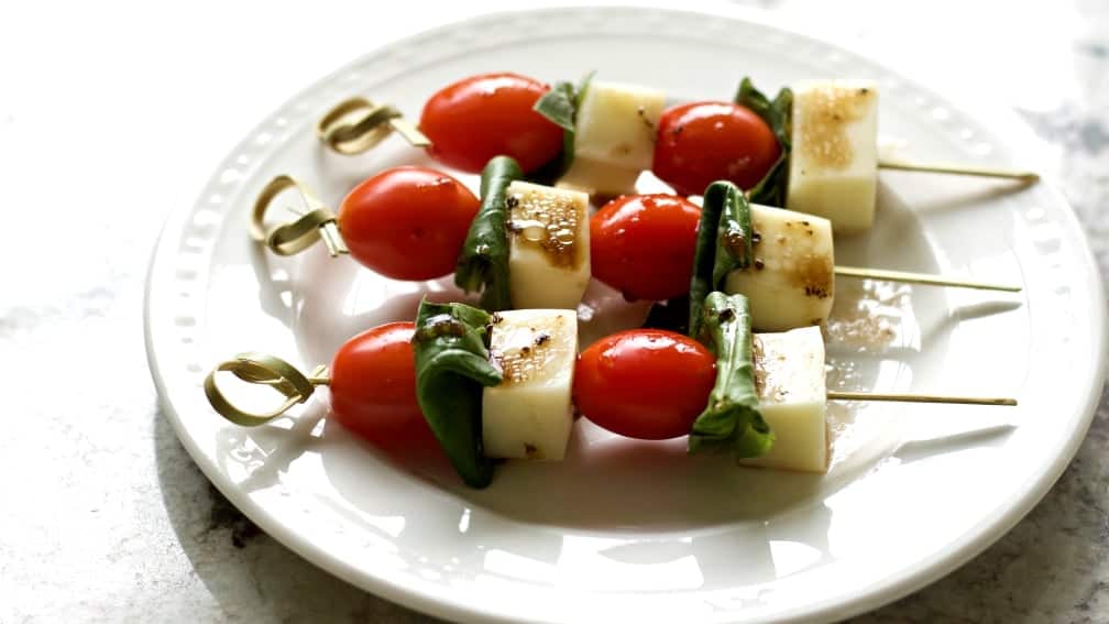 Caprese Salad Bites Appetizer Recipe 2 Caprese Salad Bites on a party plate