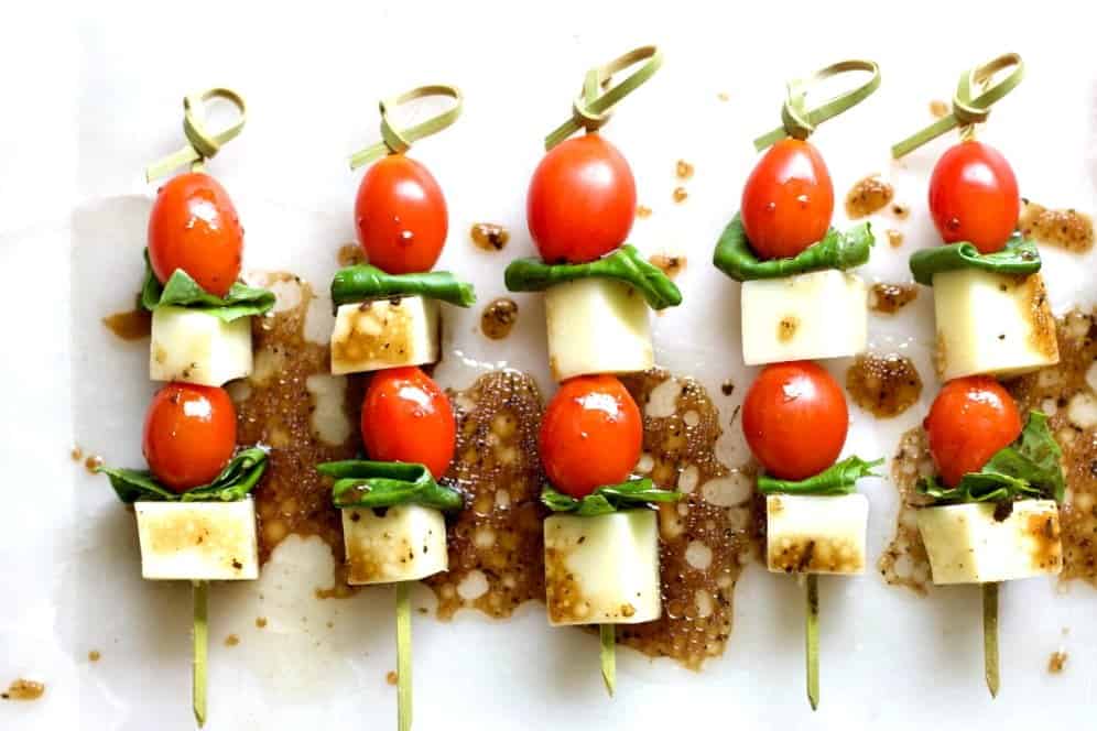 caprese appetizers on a party tray
