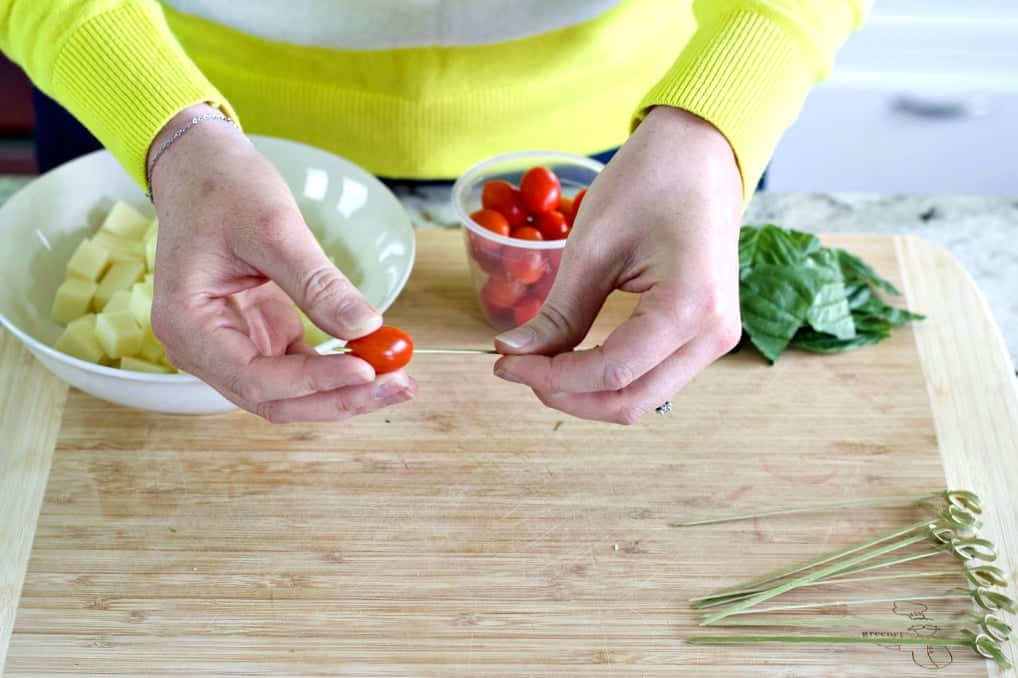 Caprese Salad Bites Appetizer Recipe 7 spear the tomato lengthwise
