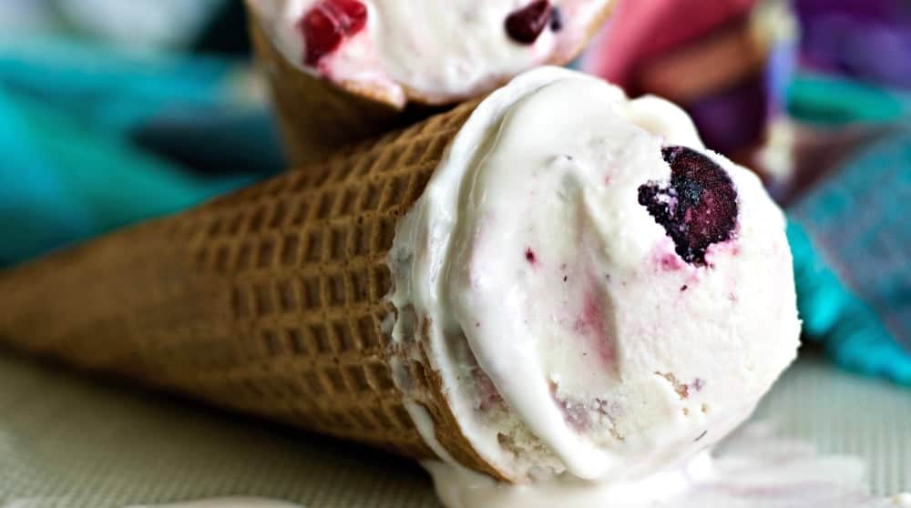 Infused with rich maple and brown sugar flavor, this creamy textured Berry Buttermilk Ice Cream contains no white sugar. This recipe is easy to make! No eggs or custard making required for this scrumptious homemade ice cream. Whisk the few ingredients, and pour it in your freezer bowl. Soft set in less than 1/2 hour! Low-Sodium, Vegetarian, Gluten-Free!