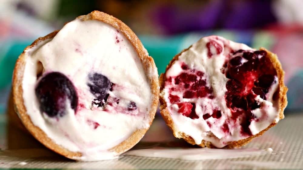 Infused with rich maple and brown sugar flavor, this creamy textured Berry Buttermilk Ice Cream contains no white sugar. This recipe is easy to make! No eggs or custard making required for this scrumptious homemade ice cream. Whisk the few ingredients, and pour it in your freezer bowl. Soft set in less than 1/2 hour! Low-Sodium, Vegetarian, Gluten-Free!