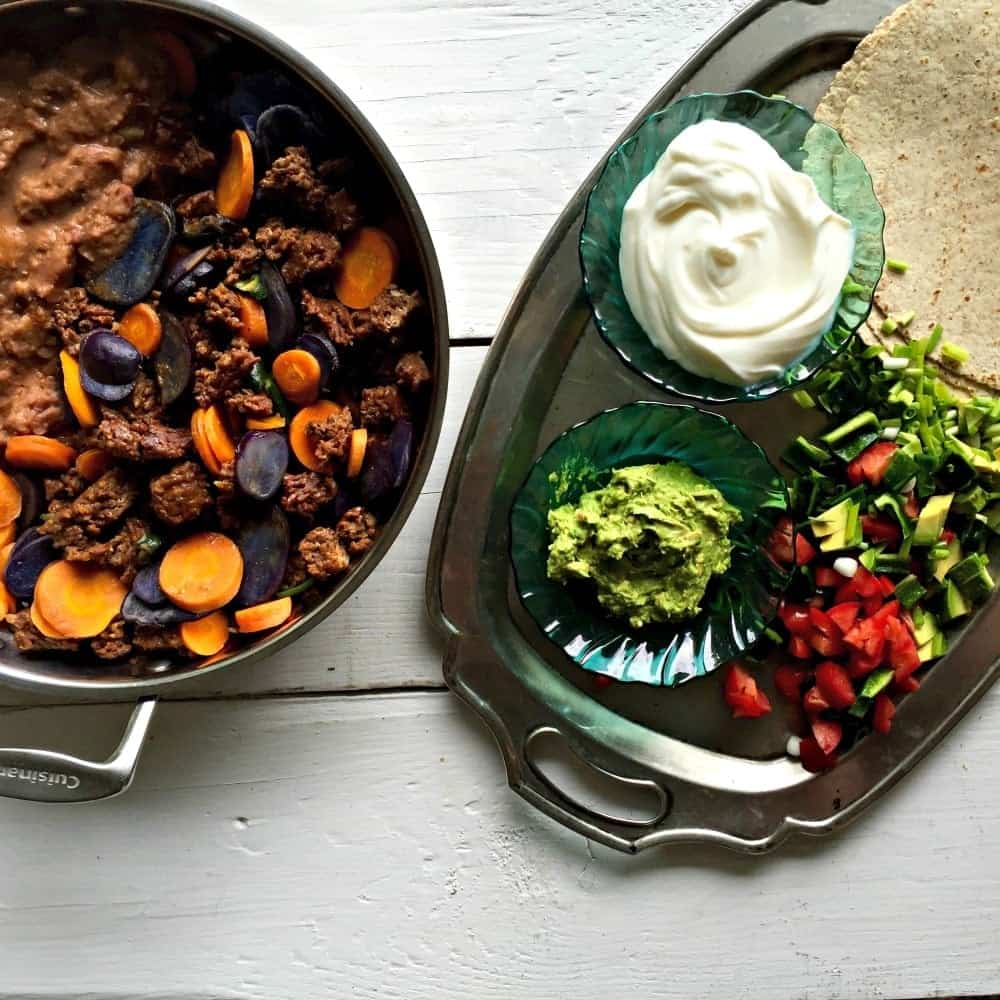 Purple Potato Chorizo Burrito is low carb, high fiber, gluten free. This quick and easy one skillet meal is made with the healthiest Potatoes! https://homemadefoodjunkie.1wp.site