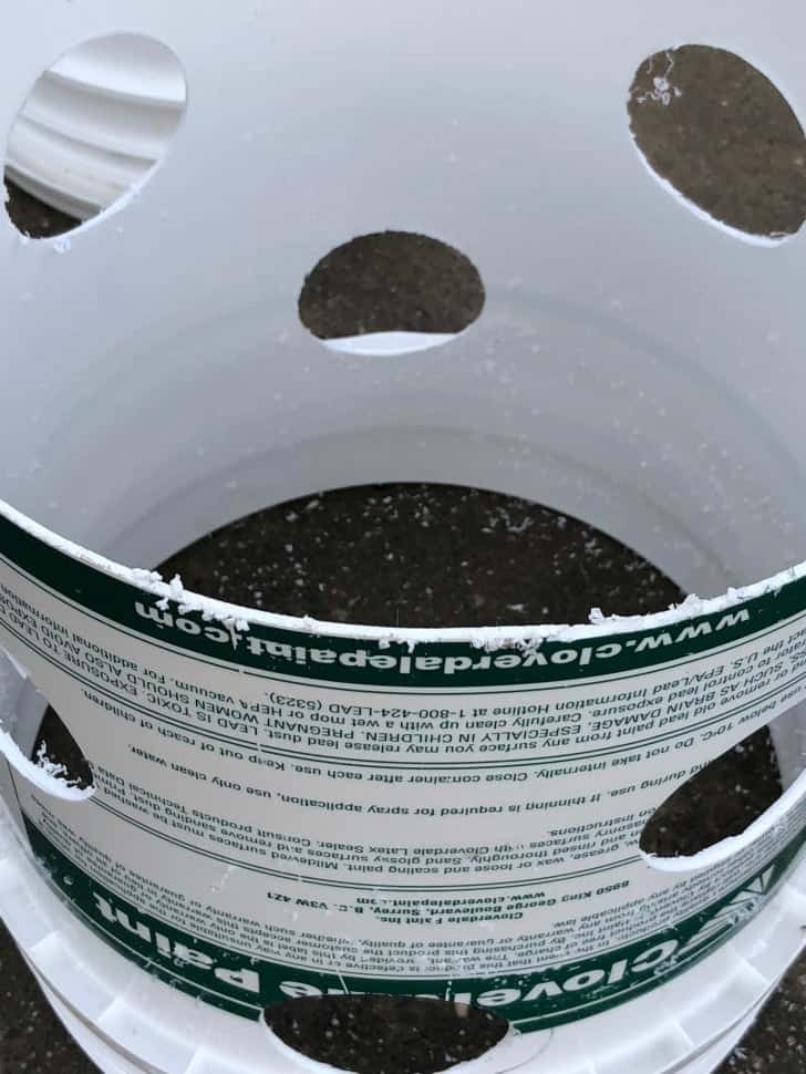 cut bucket with holes for DIY strawberry towers