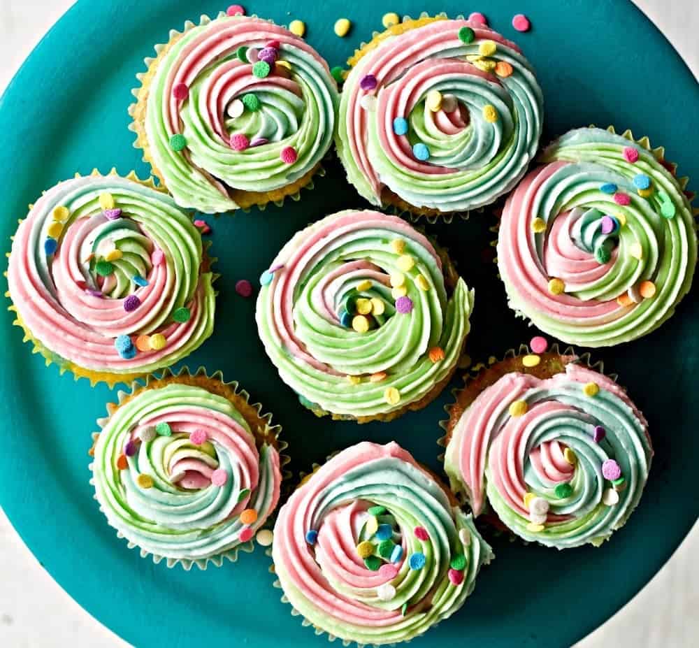 These adorable multi colored rainbow cupcakes are not only delicious, they are super cute! Colorful and fun, they are sure to be a hit at any gathering.