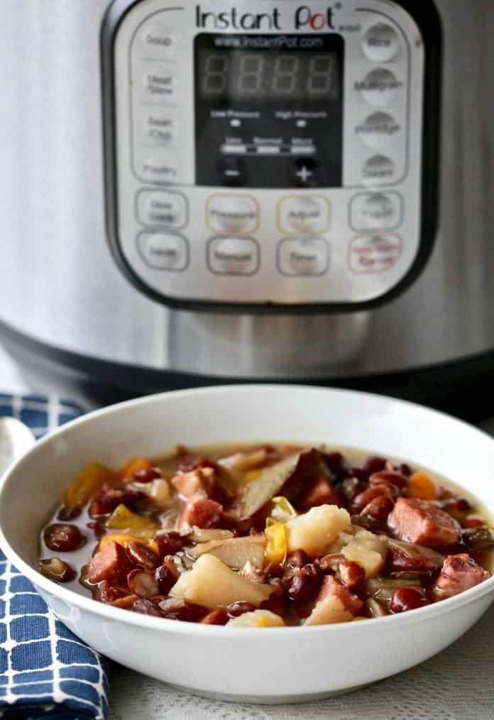 Instant Pot Hambone Bean Soup is easy to make and stretches a dollar tight! Your Family will love this richly flavored smoky soup. #dairyfree #glutenfree #hambone #hambonesoup #instantpotrecipe