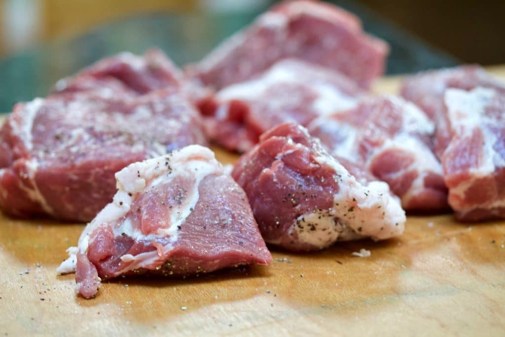 seasoned cut up Pork shoulder