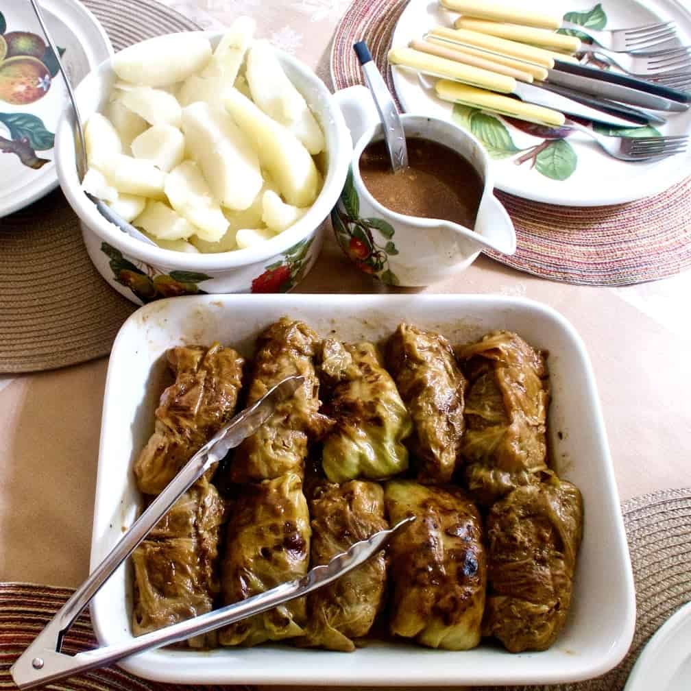 German Cabbage Rolls dinner with Gravy and potatoes ready to serve.