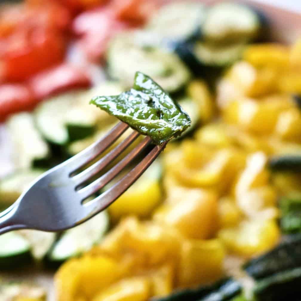 Roasted pepper on a fork.