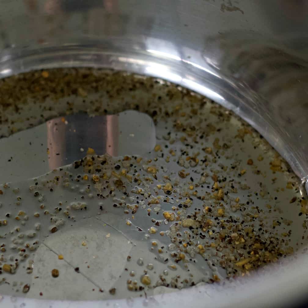 oil and seasonings in instant pot.