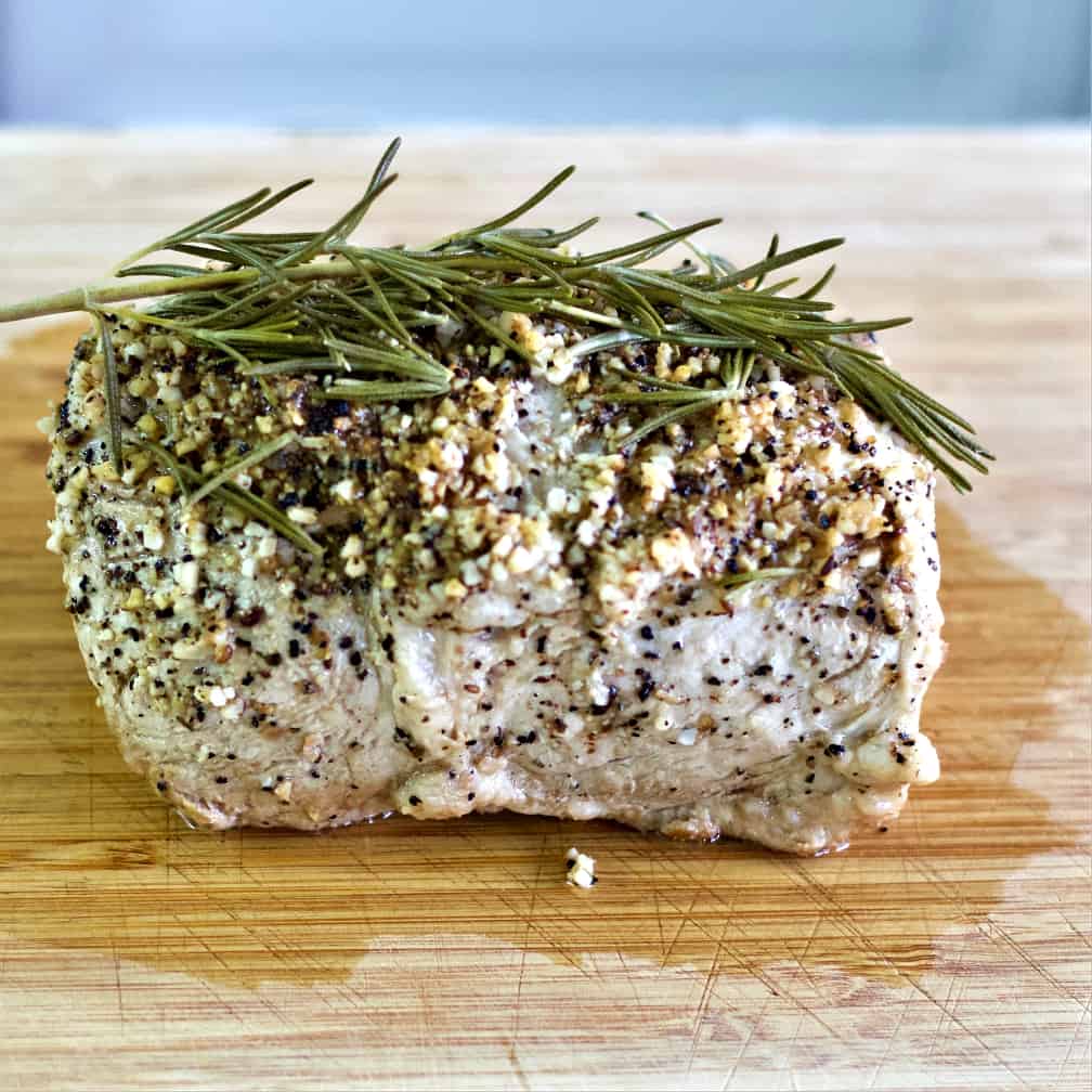 lay the finished pork roast on board to rest.