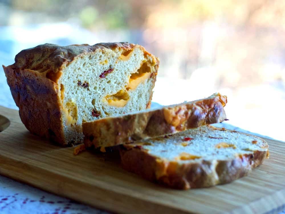 Sourdough Cheesy Pepper bread cut on a plate. Crumb shot.