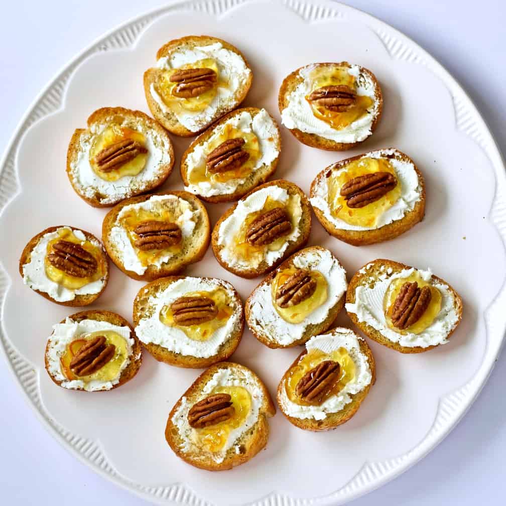 a party tray loaded with Crostini appetizers