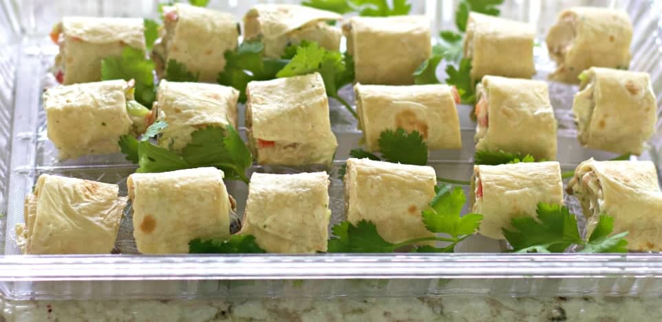 Tortilla pinwheels on a tray side shot.