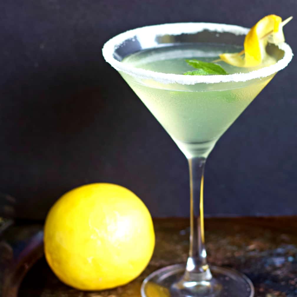 lemon drop martini with fresh lemon