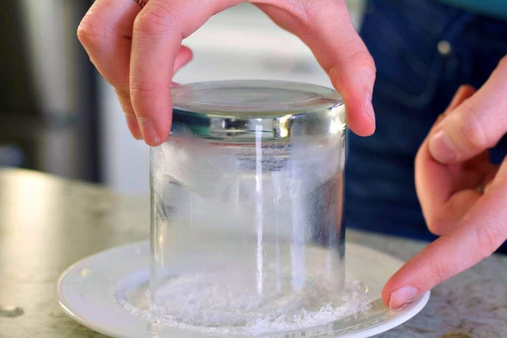 rimming a glass with salt and sugar