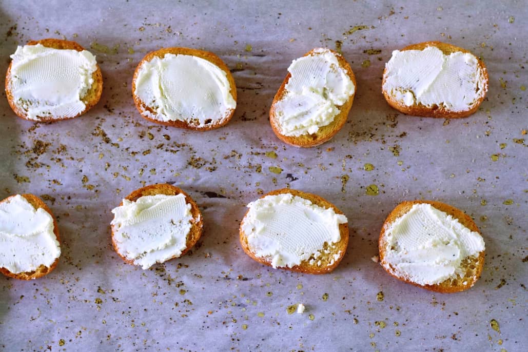 Goat Cheese Crostini Appetizer with Marmalade and Pecan 11 spread on the goat cheese