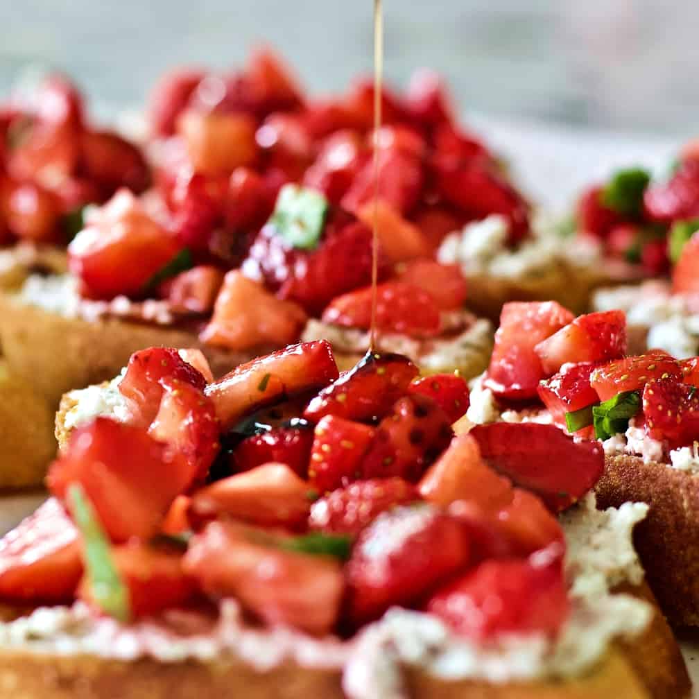 drizzle balsamic glaze over strawberry topping