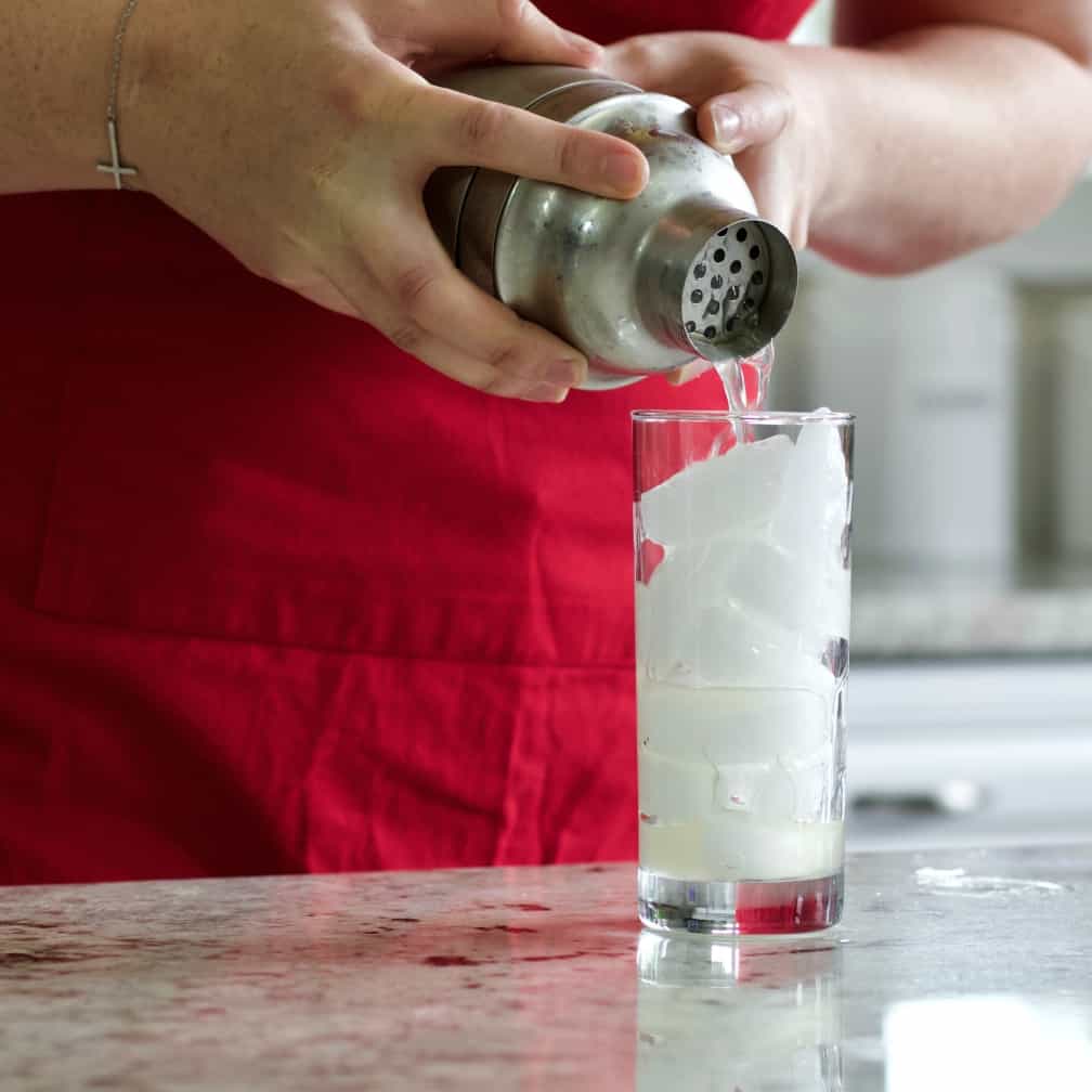 pouring a Mexican Mule cocktail