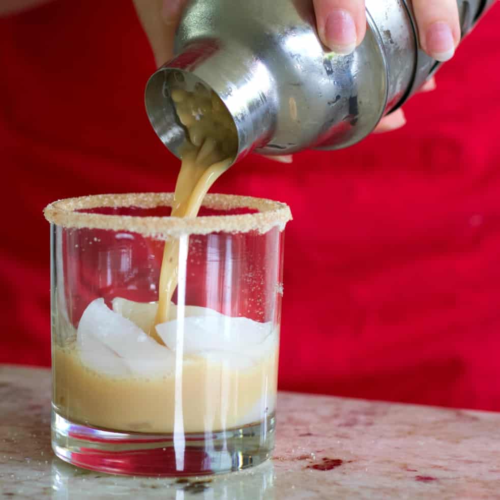 Pour the cocktail into your rimmed glass