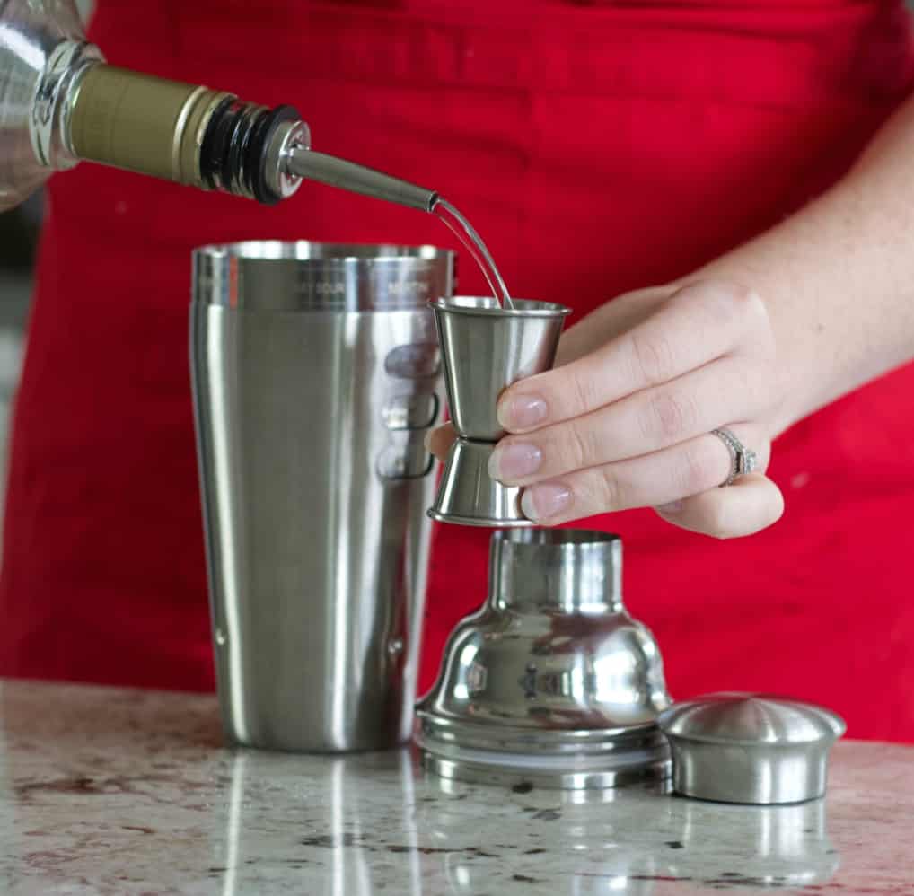 Pour whipped cream vodka into jigger