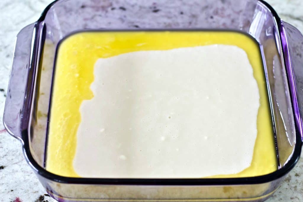 Pour the batter over the butter