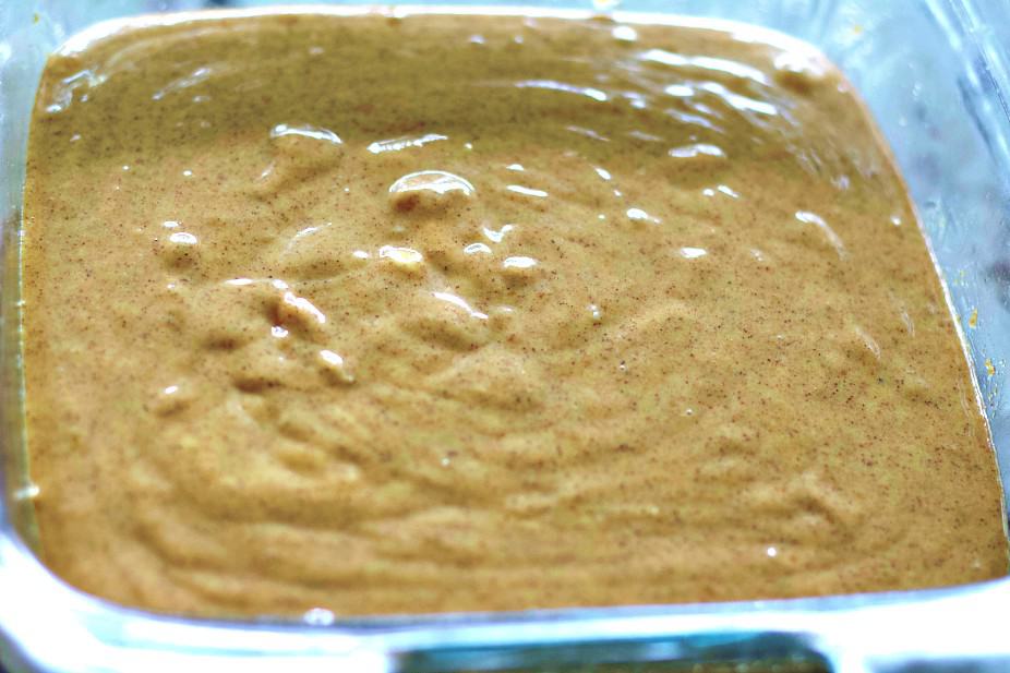 pour the pumpkin cheesecake layer over the pressed in baked crust